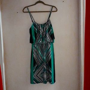 Black, white and turquoise dress. Polyester and lycra. Adjustable straps. S